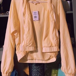 light yellow cropped windbreaker